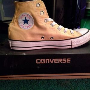 Yellow converse hi tops